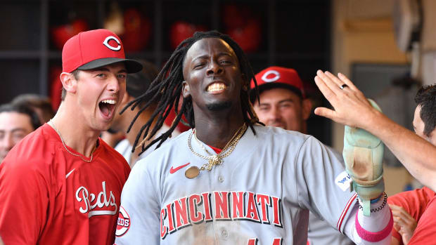 Jul 8, 2023; Milwaukee, Wisconsin, USA; Cincinnati Reds shortstop Elly De La Cruz (44) celebrates in the dugout after scoring a run against the Milwaukee Brewers in the seventh inning at American Family Field. Mandatory Credit: Michael McLoone-USA TODAY Sports 