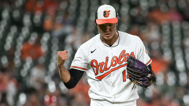 Sep 13, 2023; Baltimore, Maryland, USA; Baltimore Orioles relief pitcher Shintaro Fujinami (14) exacts after the pitching the ninth inning against the St. Louis Cardinals at Oriole Park at Camden Yards. Mandatory Credit: Tommy Gilligan-USA TODAY Sports