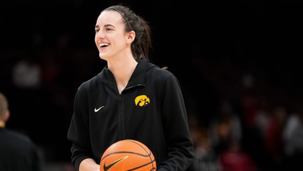 Iowa guard Caitlin Clark (22) warms up prior to the Hawkeyes' game against Ohio State at Value City Arena in Columbus, Ohio on Jan. 21, 2024.