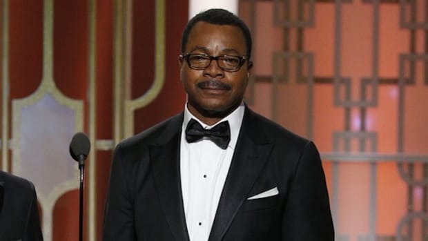 Jan 8, 2017; Beverly Hills, CA, USA; Carl Weathers, who co-starred in the 1977 Golden Globe Award-winning film Rocky, presents the Golden Globe for best motion picture - drama with Sylvester Stallone during the 74th Golden Globe Awards at Beverly Hilton. Mandatory Credit: Paul Drinkwater/NBC via USA TODAY NETWORK