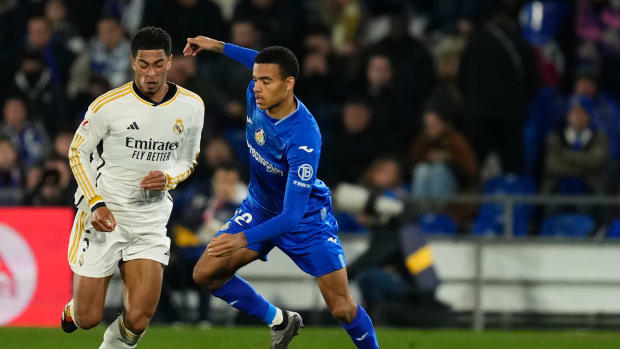 Real Madrid midfielder Jude Bellingham (left) and Getafe striker Mason Greenwood pictured during a game in Spain's La Liga in February 2024