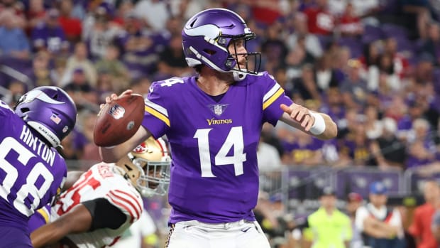 Aug 20, 2022; Minneapolis, Minnesota, USA; Minnesota Vikings quarterback Sean Mannion (14) throws during the fourth quarter against the San Francisco 49ers at U.S. Bank Stadium.