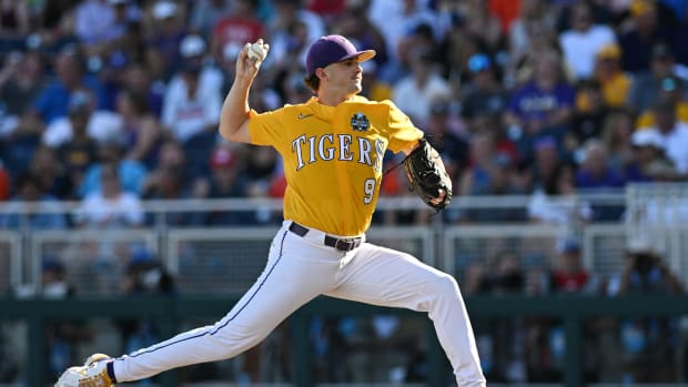 Jun 24, 2023; Omaha, NE, USA; LSU Tigers pitcher Ty Floyd (9) pitches against the Florida Gators in the first inning at Charles Schwab Field Omaha. Mandatory Credit: Steven Branscombe-USA TODAY Sports  