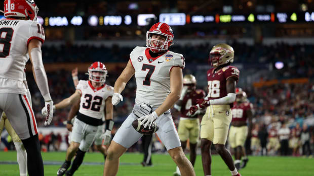 Dec 30, 2023; Miami Gardens, FL, USA; Georgia Bulldogs tight end Lawson Luckie (7) reacts after scoring a touchdown against the Florida State Seminoles during the second half in the 2023 Orange Bowl at Hard Rock Stadium.