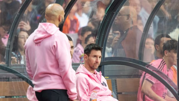 Lionel Messi pictured sitting on the bench during Inter Miami's 4-1 win over a Hong Kong XI in February 2024
