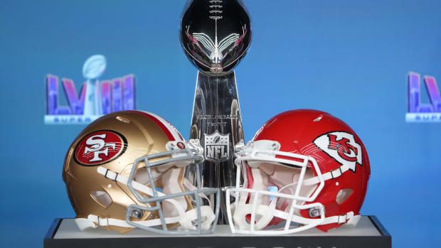 Feb 5, 2024; Las Vegas, NV, USA; Helmets for the San Francisco 49ers and Kansas City Chiefs on display with the Vince Lombardi Trophy before NFL commissioner Roger Goodell speaks at a press conference in advance of Super Bowl LVIII between the Kansas City Chiefs and San Francisco 49ers at Allegiant Stadium. Mandatory Credit: Kirby Lee-USA TODAY Sports  