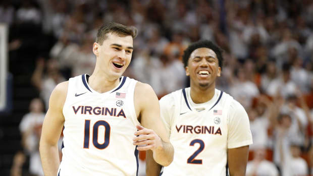 Virginia Cavaliers guard Taine Murray (10) celebrates after scoring against the Miami (Fl) Hurricanes during the first half at John Paul Jones Arena.