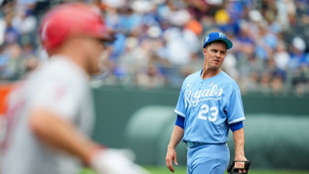 Jun 18, 2023; Kansas City, Missouri, USA; Kansas City Royals starting pitcher Zack Greinke (23) reacts after giving up a home run to Los Angeles Angels center fielder Mike Trout (27) during the fifth inning at Kauffman Stadium.