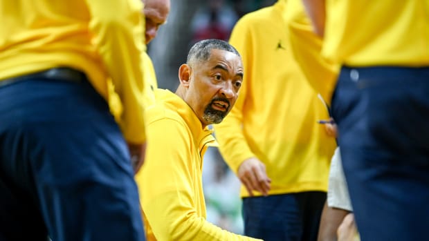 Michigan's head coach Juwan Howard talks to the team during a timeout in the first half against Michigan State on Tuesday, Jan. 30, 2024, at the Breslin Center in East Lansing.