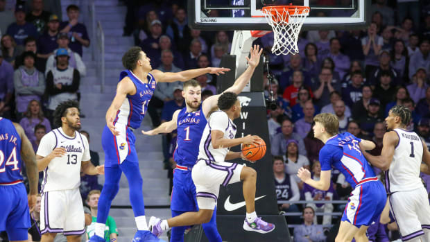 Kansas State's Tylor Perry drives to the hoop for a layup