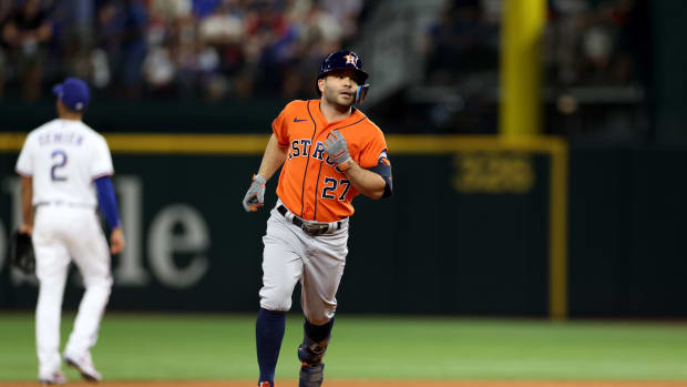 Oct 20, 2023; Arlington, Texas, USA; Houston Astros second baseman Jose Altuve (27) rounds the bases after hitting a three-run home run during the ninth inning of game five in the ALCS against the Texas Rangers for the 2023 MLB playoffs at Globe Life Field.