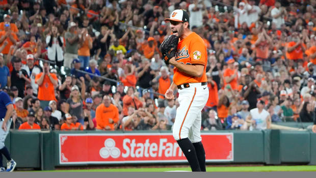 Sep 16, 2023; Baltimore, Maryland, USA; Baltimore Orioles pitcher Grayson Rodriguez (30) reacts to getting the last out in the eighth inning against the Tampa Bay Rays at Oriole Park at Camden Yards. Mandatory Credit: Gregory Fisher-USA TODAY Sports