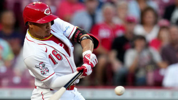 Cincinnati Reds shortstop Noelvi Marte (16) hits a one-run single in the second inning of a baseball game against the Minnesota Twins, Monday, Sept. 18, 2023, at Great American Ball Park in Cincinnati.  