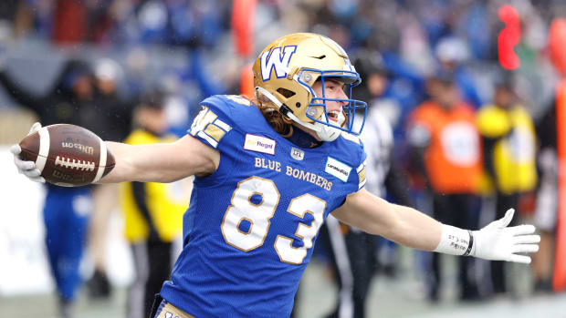 Nov 13, 2022; Winnigeg, Manitoba, CAN; Winnipeg Blue Bombers wide receiver Dalton Schoen (83) scores a touchdown in the first half against the BC Lions at Investors Group Field. Mandatory Credit: James Carey Lauder-USA TODAY Sports  