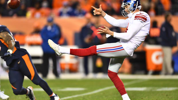 Oct 15, 2017; Denver, CO, USA; New York Giants punter Brad Wing (9) punts away in the second half against the Denver Broncos at Sports Authority Field at Mile High. Mandatory Credit: Ron Chenoy-USA TODAY Sports  