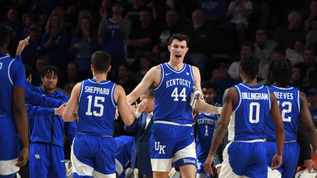 Feb 6, 2024; Nashville, Tennessee, USA; Kentucky Wildcats forward Zvonimir Ivisic (44) celebrates with teammates during a timeout during the first half against the Vanderbilt Commodores at Memorial Gymnasium. Mandatory Credit: Christopher Hanewinckel-USA TODAY Sports