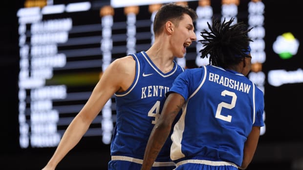 Feb 6, 2024; Nashville, Tennessee, USA; Kentucky Wildcats forward Zvonimir Ivisic (44) celebrates with forward Aaron Bradshaw (2) after a basket during the second half against the Vanderbilt Commodores at Memorial Gymnasium. Mandatory Credit: Christopher Hanewinckel-USA TODAY Sports