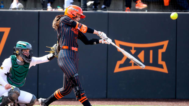 Oklahoma State outfielder Scotland David (3) hits a pitch during a college softball game between the Oklahoma State Cowgirls (OSU) and the Baylor Bears at Cowgirl Stadium in Stillwater, Okla., on Saturday, March 25, 2023. Osu Vs Baylor