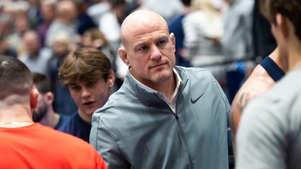 Penn State wrestling coach Cael Sanderson guides the Nittany Lions in a match against Ohio State at Rec Hall.