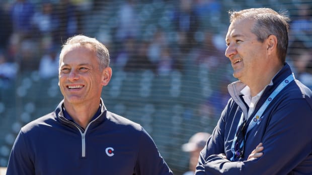 Oct 1, 2022; Chicago, Illinois, USA; Chicago Cubs President of baseball operations Jed Hoyer (L) smiles next to Chicago Cubs Chairman Tom Ricketts (R) before a baseball game between the Chicago Cubs and Cincinnati Reds at Wrigley Field. Mandatory Credit: Kamil Krzaczynski-USA TODAY Sports