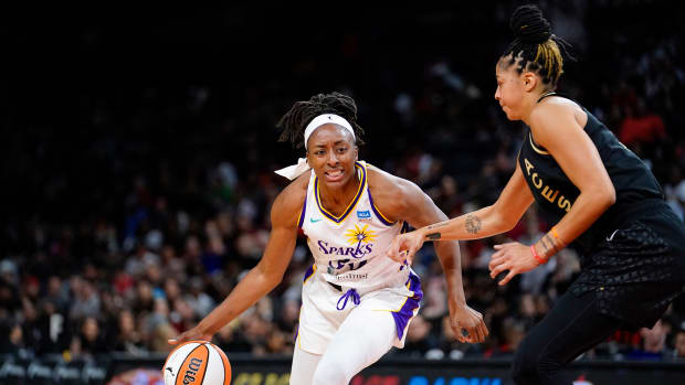 May 27, 2023; Las Vegas, Nevada, USA; Los Angeles Sparks forward Nneka Ogwumike (30) dribbles the ball against Las Vegas Aces forward/center Candace Parker (3) during the third quarter at Michelob Ultra Arena. Mandatory Credit: Lucas Peltier-USA TODAY Sports