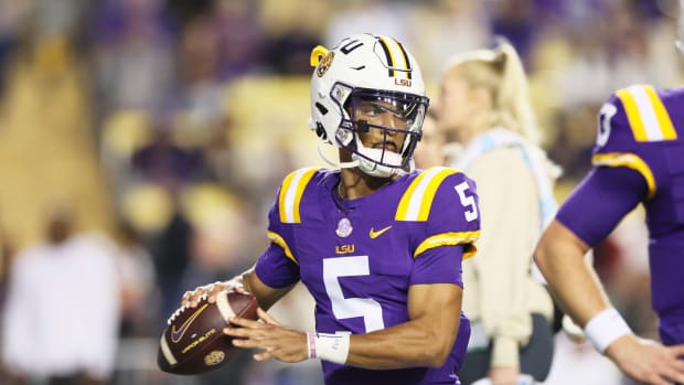 Nov 18, 2023; Baton Rouge, Louisiana, USA; Heisman Trophy candidate LSU Tigers quarterback Jayden Daniels (5) warms up before their game against the Georgia State Panthers at Tiger Stadium.