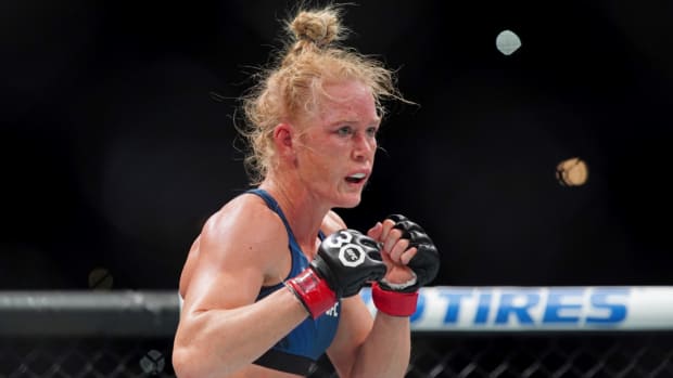 Mar 25, 2023; San Antonio, Texas, USA; Holly Holm (red gloves) fights Yana Santos (not pictured) during UFC Fight Night at AT&T Center. Mandatory Credit: Aaron Meullion-USA TODAY Sports