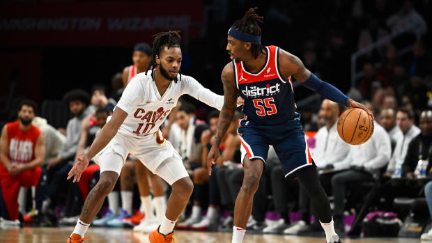 Feb 7, 2024; Washington, District of Columbia, USA; Washington Wizards guard Delon Wright (55) is defended by Cleveland Cavaliers guard Darius Garland (10) during the first half at Capital One Arena. Mandatory Credit: Brad Mills-USA TODAY Sports