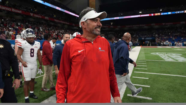 Dec 28, 2023; San Antonio, TX, USA; Arizona Wildcats head coach Jedd Fisch reacts at the end of the Alamo Bowl against the Oklahoma Sooners at Alamodome. Mandatory Credit: Kirby Lee-USA TODAY Sports