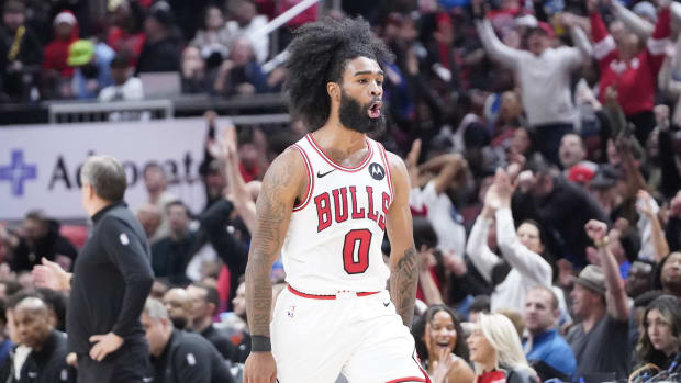 Chicago Bulls guard Coby White (0) reacts after making a three-point basket against the Minnesota Timberwolves during the second half at United Center. Mandatory