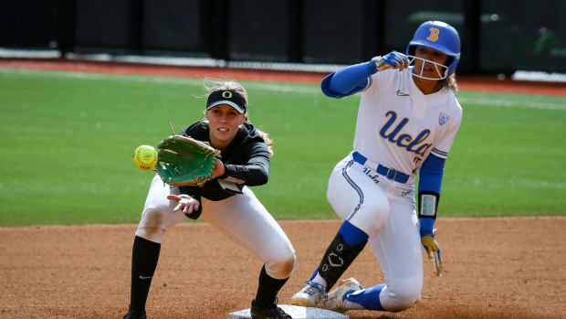 Oregon infielder Allee Bunker makes a catch as UCLA utility player Maya Brady slides into second base as the Oregon Ducks fell to UCLA 7-4 Saturday, March 25, 2023 at Jane Sanders Stadium in Eugene, Ore. Sports Oregon Softball Vs Ucla