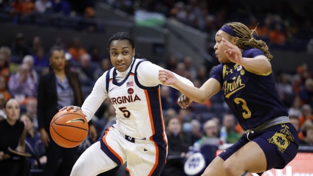Yonta Vaughn drives the ball during the Virginia women's basketball game against Notre Dame at John Paul Jones Arena.