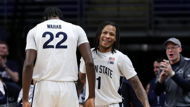Penn State guard Ace Baldwin Jr. celebrates with Qudus Wahab during the Nittany Lions' Big Ten victory over Iowa at the Bryce Jordan Center.