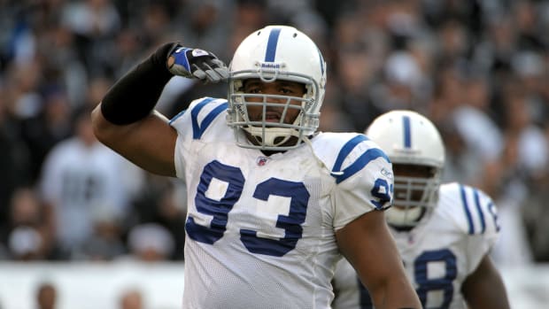 Dec 26, 2010; Oakland, CA, USA; Indianapolis Colts defensive end Dwight Freeney (93) reacts after a tackle against the Oakland Raiders at the Oakland-Alameda County Coliseum. The Colts defeated the Raiders 31-26. Mandatory Credit: Kirby Lee/Image of Sport-USA TODAY Sports