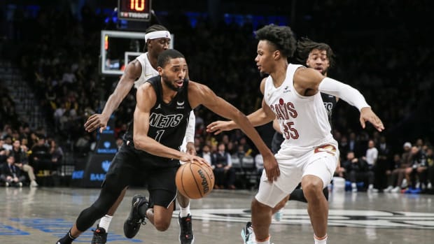 Brooklyn Nets forward Mikal Bridges (1) looks to drive past Cleveland Cavaliers forward Isaac Okoro (35) in the third quarter at Barclays Center.
