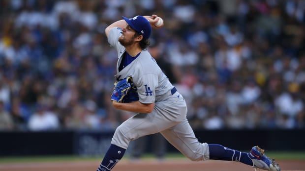 Jun 23, 2021; San Diego, California, USA; Los Angeles Dodgers starting pitcher Trevor Bauer (27) throws a pitch against the San Diego Padres during the first inning at Petco Park. 