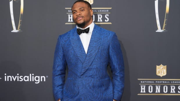 Cowboys pass rusher Micah Parsons poses for pictures at the NFL Honors red carpet.