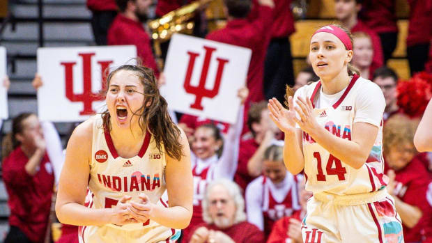 Indiana's Mackenzie Holmes (54) and Sara Scalia (14) celebrate a Hoosier lead during the second half of the Indiana versus Michigan State women's basketball game at Simon Skjodt Assembly Hall on Thursday, Feb. 8, 2024.