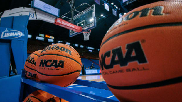 Feb 10, 2024; Lawrence, Kansas, USA; Practice basketballs sit court side prior to a game between the Kansas Jayhawks and the Baylor Bears at Allen Fieldhouse. Mandatory Credit: William Purnell-USA TODAY Sports  