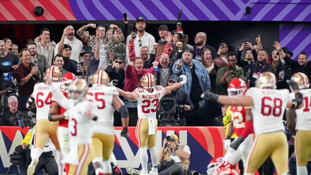 Feb 11, 2024; Paradise, Nevada, USA; San Francisco 49ers running back Christian McCaffrey (23) reacts after scoring a touchdown against the Kansas City Chiefs during the second quarter of Super Bowl LVIII at Allegiant Stadium. Mandatory Credit: Kyle Terada-USA TODAY Sports 