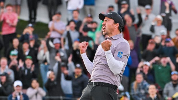 Nick Taylor of Canada celebrates with a fist pump after making a birdie putt on the 18th hole to win a playoff in the final round of the WM Phoenix Open at TPC Scottsdale (Stadium Course) on February 11, 2024 in Scottsdale, Arizona.