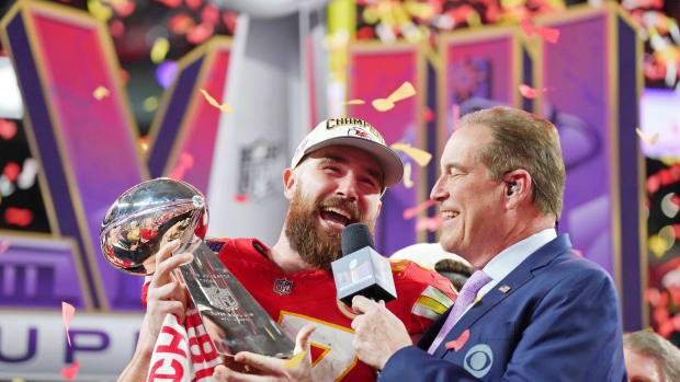 Feb 11, 2024; Paradise, Nevada, USA; Kansas City Chiefs tight end Travis Kelce (87) celebrates while being interviewed by CBS commentator Jim Nantz after winning Super Bowl LVIII against the San Francisco 49ers at Allegiant Stadium. Mandatory Credit: Kirby Lee-USA TODAY Sports  
