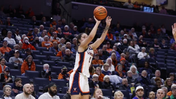 Olivia McGhee attempts a three-pointer during the Virginia women's basketball game against Notre Dame at John Paul Jones Arena.