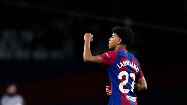 Barcelona teenager Lamine Yamal pictured celebrating after scoring his second goal of the game in a 3-3 draw against Granada in February 2024