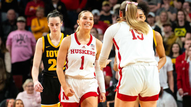 Nebraska Cornhuskers guard Jaz Shelley (1) celebrates after making a three point shot against Iowa Hawkeyes guard Caitlin Clark (22) during the fourth quarter at Pinnacle Bank Arena.