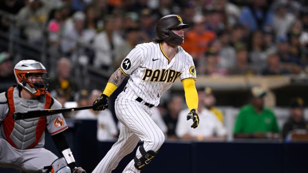 Aug 15, 2023; San Diego, California, USA; San Diego Padres right fielder Ben Gamel (16) hits a two-RBI double against the Baltimore Orioles during the fifth inning at Petco Park.