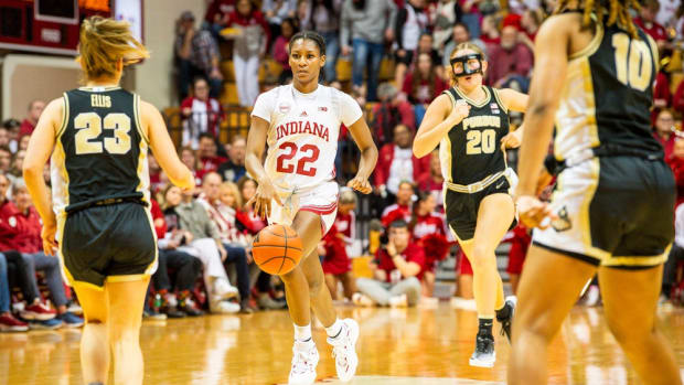 Indiana's Chloe Moore-McNeil (22) brings the ball up the floor during the second half of the Indiana versus Purdue women's basketball game at Simon Skjodt Assembly Hall on Sunday, Feb. 11, 2024.