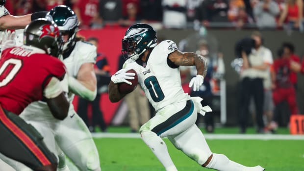 Jan 15, 2024; Tampa, Florida, USA; Philadelphia Eagles running back D'Andre Swift (0) runs the ball against the Tampa Bay Buccaneers during the second half of a 2024 NFC wild card game at Raymond James Stadium.