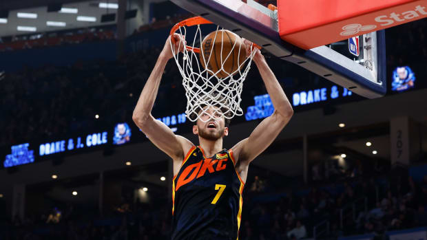 Feb 11, 2024; Oklahoma City, Oklahoma, USA; Oklahoma City Thunder forward Chet Holmgren (7) dunks against the Sacramento Kings during the second half at Paycom Center.