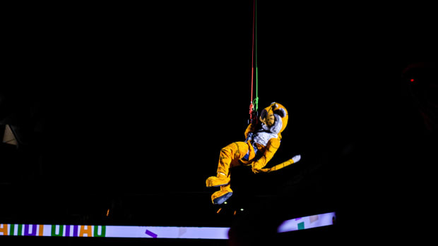 The Missouri Tiger s mascot Truman takes center stage while descending from the rafters during a college basketball game against Mississippi State at Mizzou Arena on Feb. 11, 2024, in Columbia, Mo.